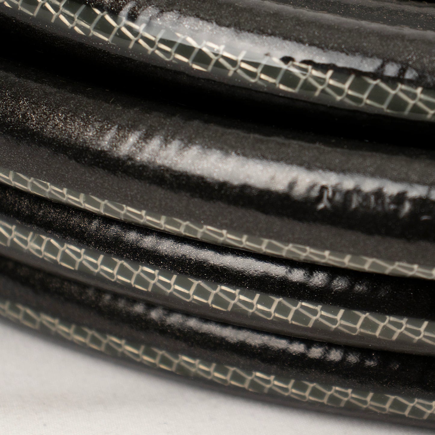 Teknor Apex 5/8-In X 50-Ft Heavy -Duty Kink Free Vinyl Gray Coiled Hose