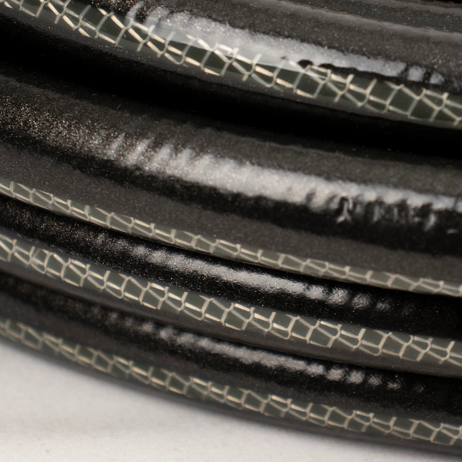 Teknor Apex 5/8-In X 50-Ft Heavy -Duty Kink Free Vinyl Gray Coiled Hose