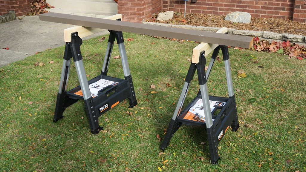 RIDGID 32 in. Polypropylene Folding Sawhorse with Adjustable Metal Legs